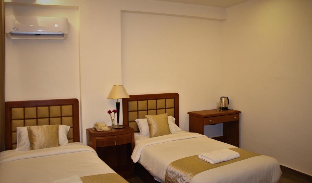 New Merryland Hotel Amman Buitenkant foto